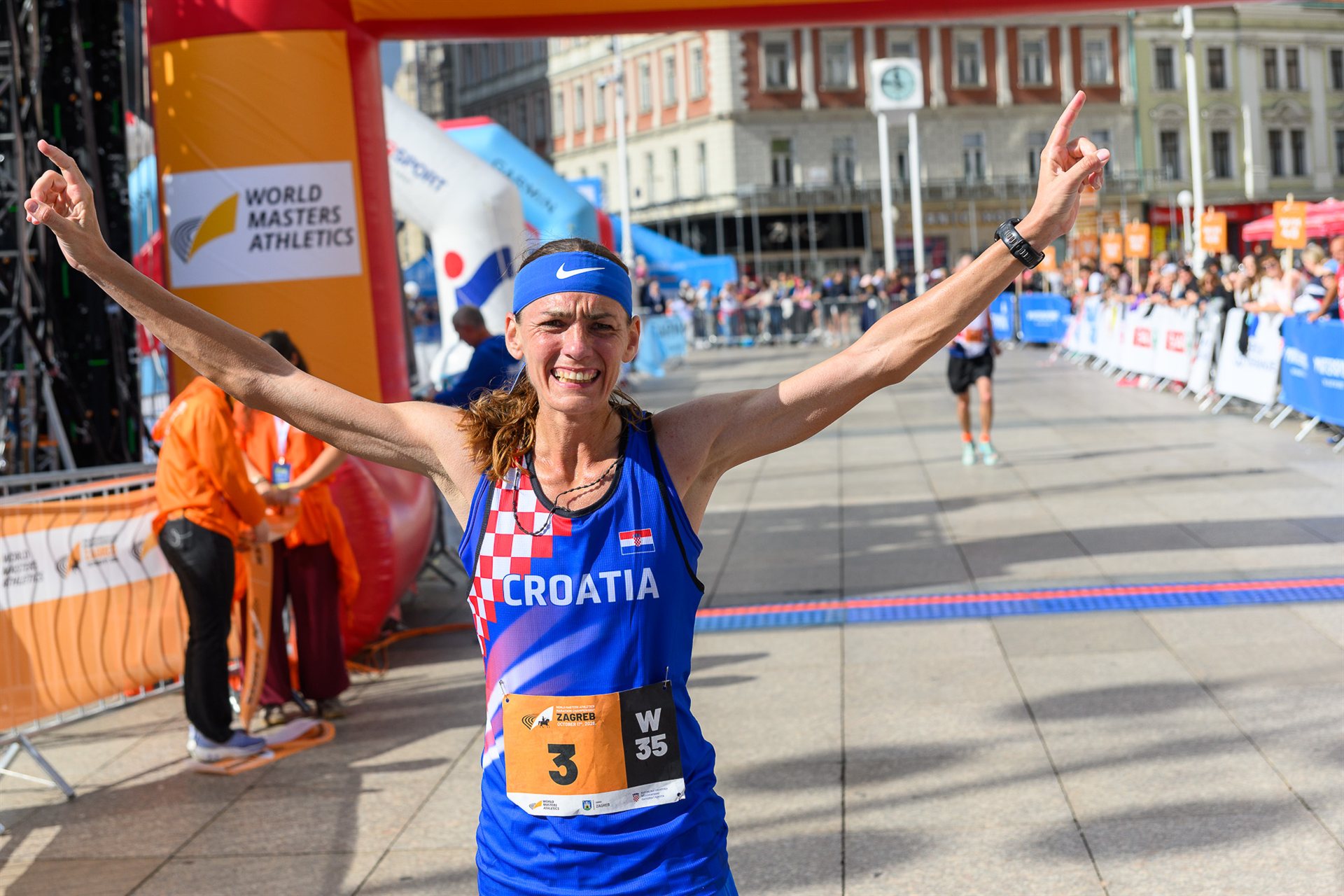 Tea Faber celebrating at the finish line of the 34th Zagreb Powerade Marathon